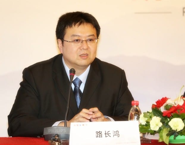 Professor Guo Weihua speaking at the press conference